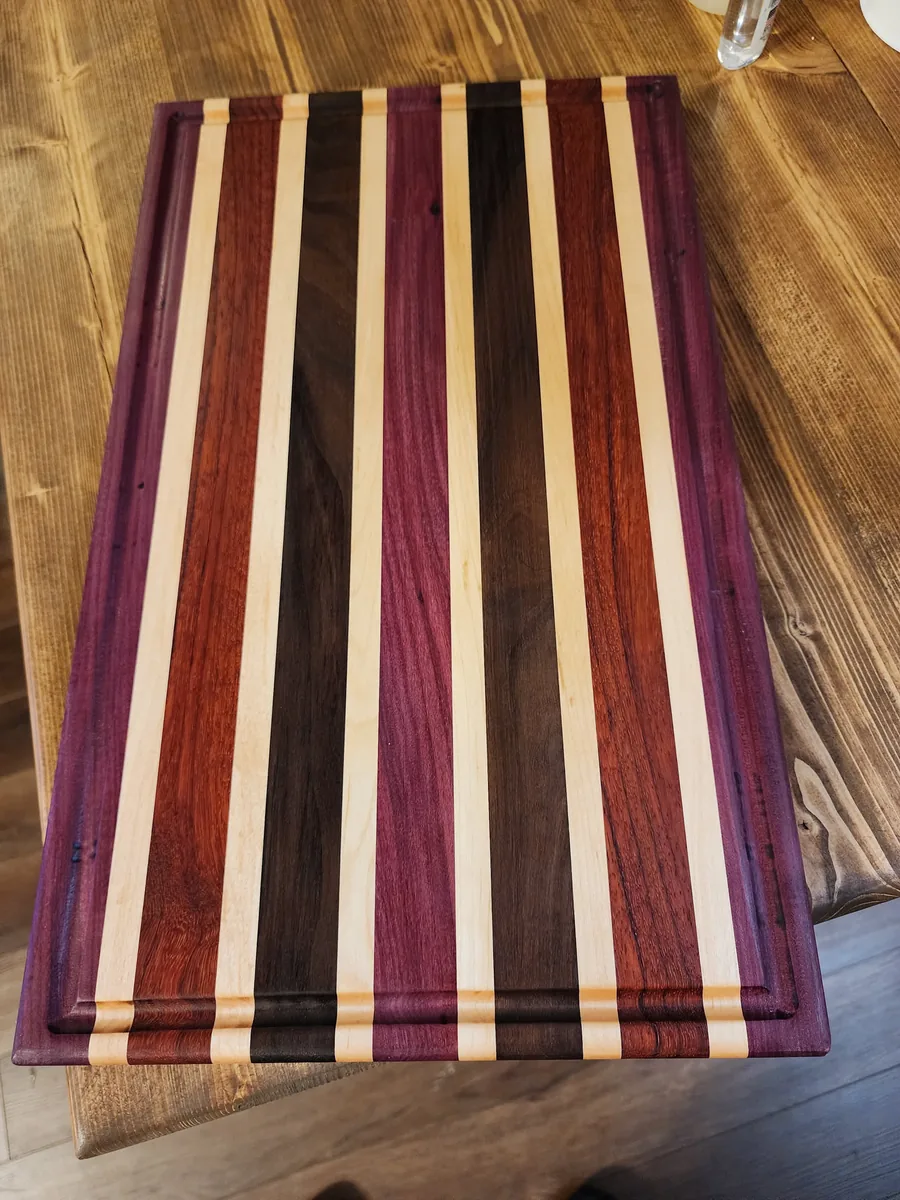Handmade mixed hardwood cutting board by Honor & Oak